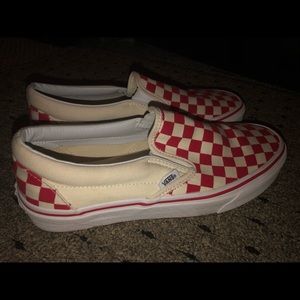 red slip-on checkered vans